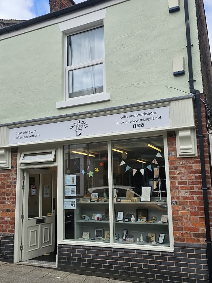 Mix a Gift shop front in Cheshire finished in sage green by Fresh Coat Decorators