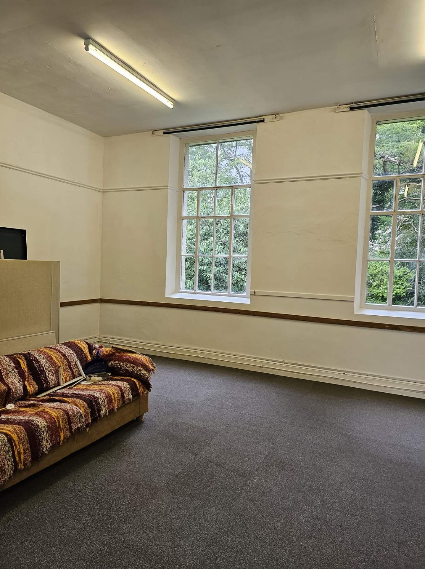 Congleton community hall side room after decorating with fresh cream walls and clean white ceiling